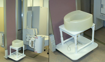 The commode needs to be radiolucent and safely attached to a fluoroscopic table